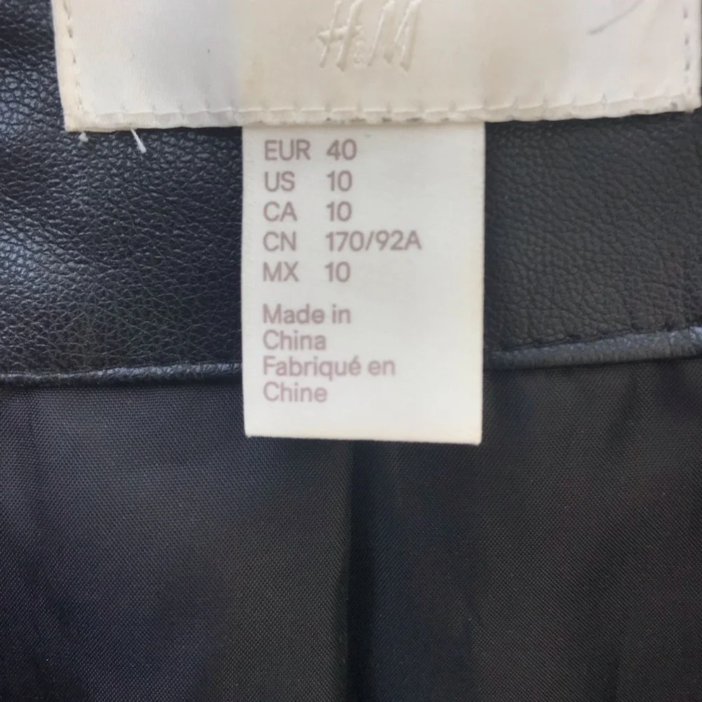 H&M Sleek Black Faux Leather Jacket with Silver Accents - Picture 6 of 6